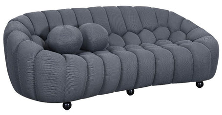 Stylish 3-seater grey sofa with boucle upholstery, perfect for lounging.